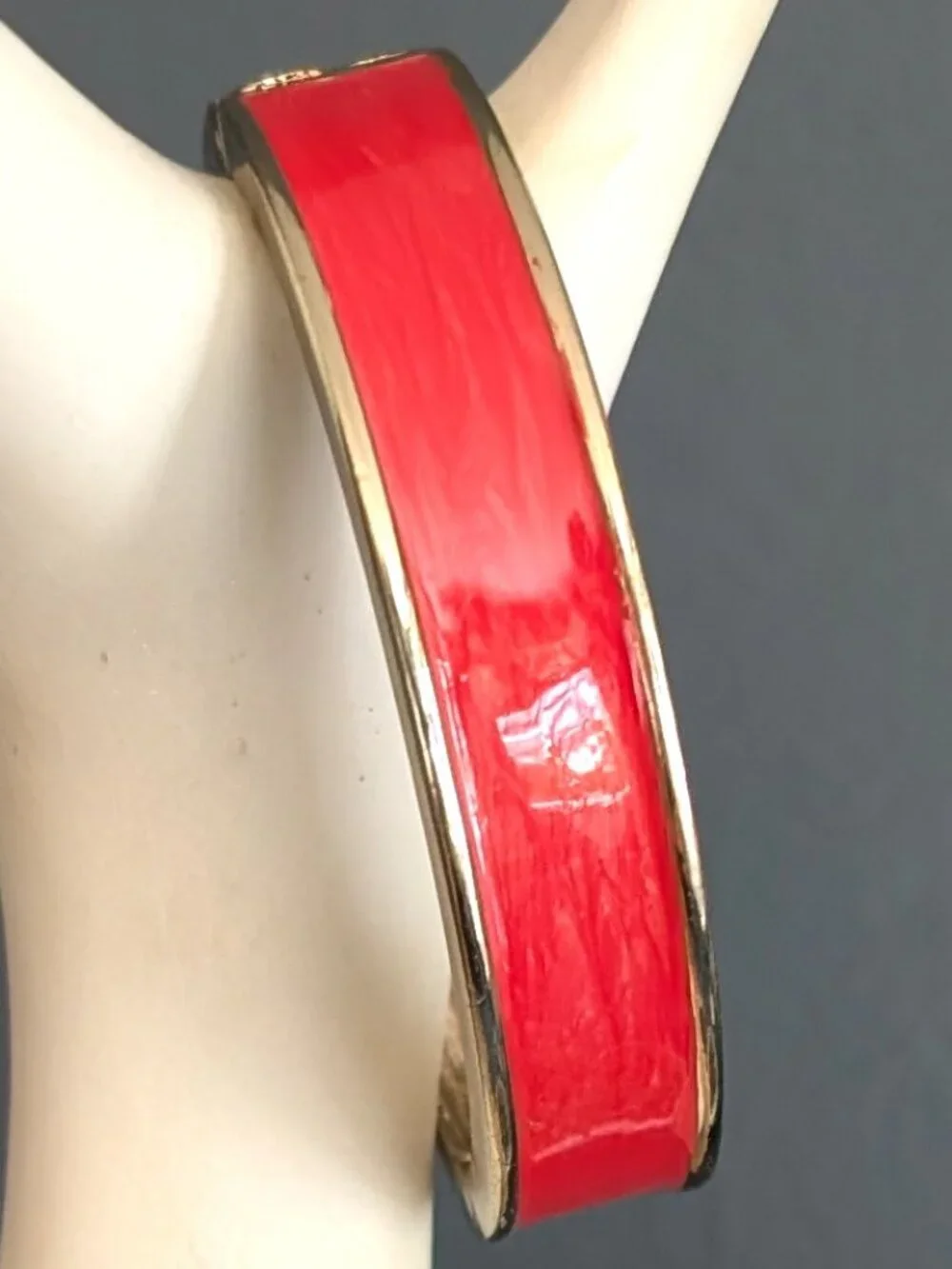 Gold and orange enamel bangle
